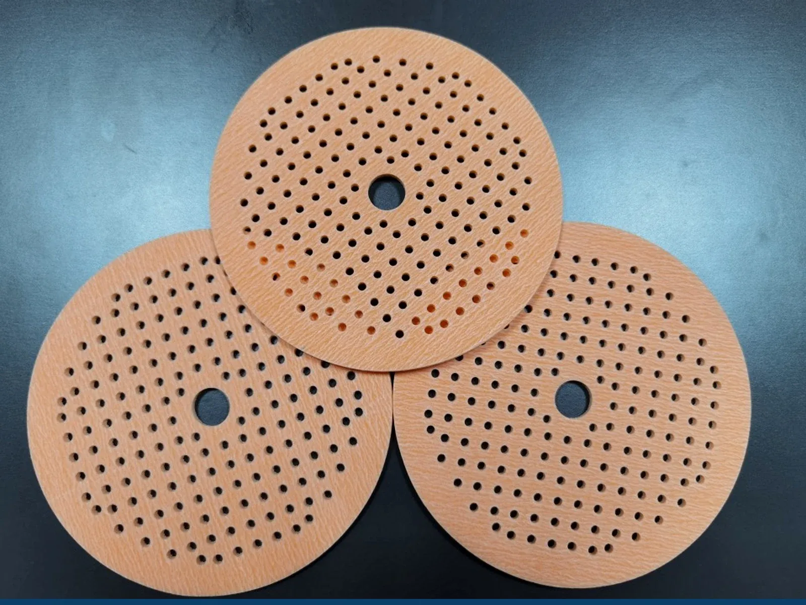 Multi-hole sponge sanding discs for curved automotive panels