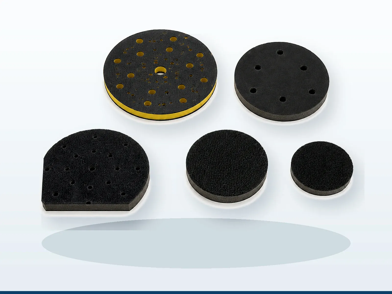 Soft interface pads for automotive sanding discs on curved panels