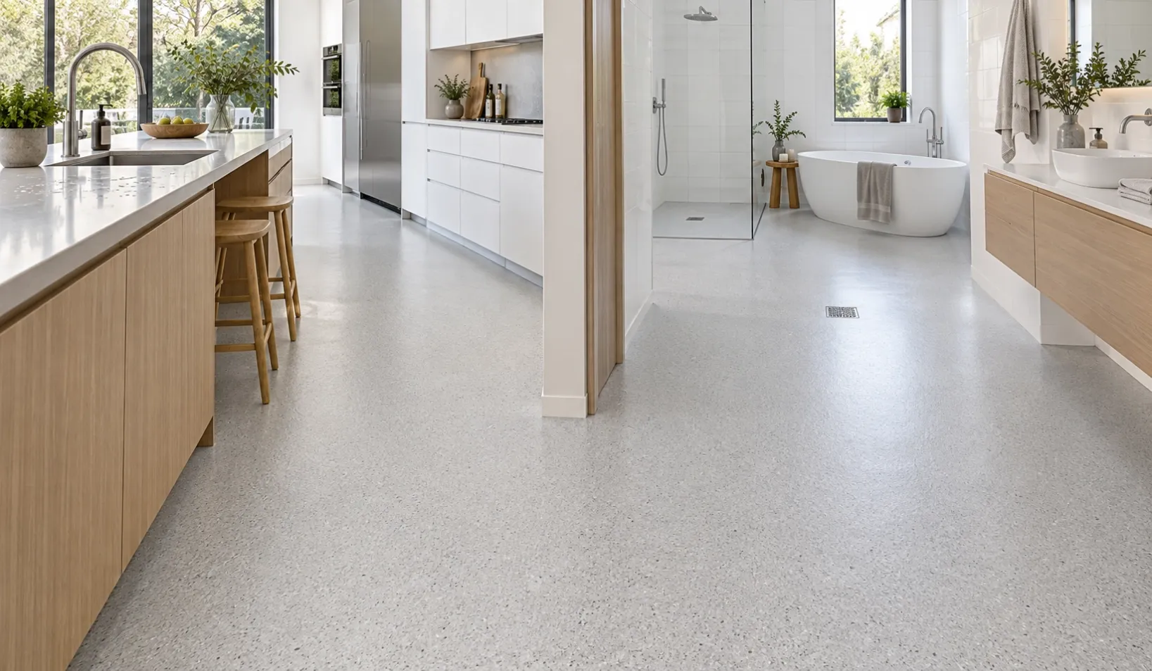 Modern kitchen and bathroom featuring waterproof, slip-resistant, seamless epoxy color sand flooring.