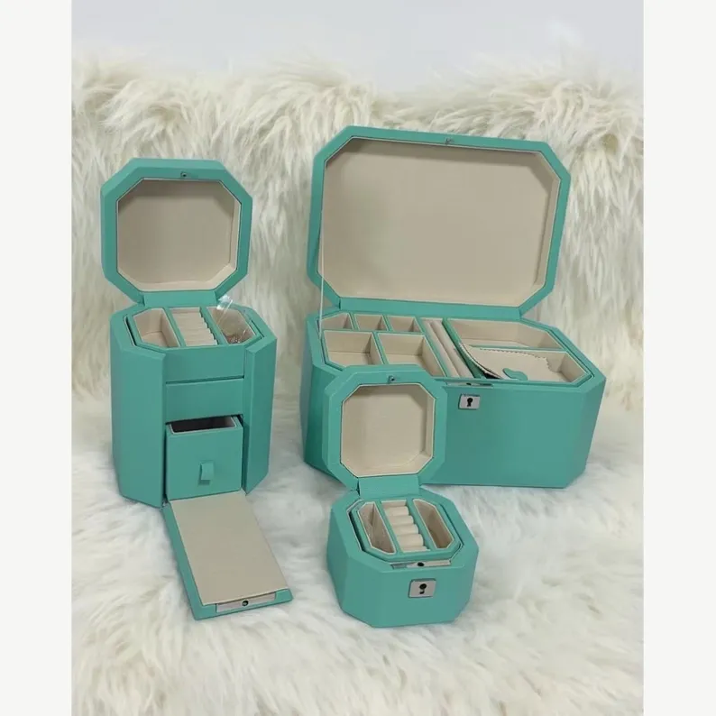 Custom leather jewelry drawer box with fitted ring and earring compartments
