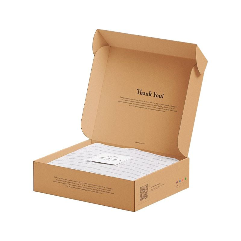 Open kraft apparel mailer box with printed thank-you message and tissue-wrapped clothing