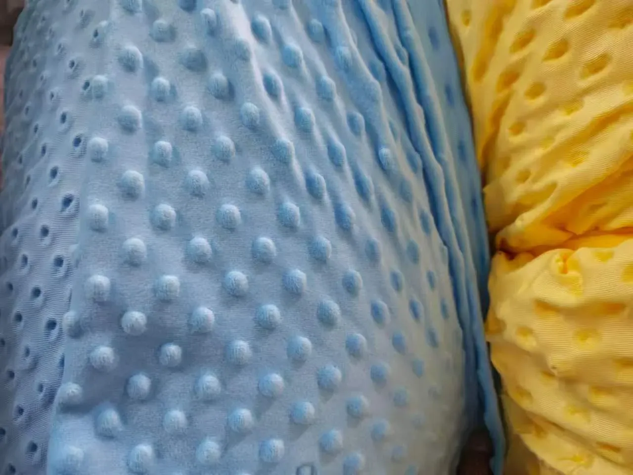 Minky dot fabric texture in blue and yellow for custom blankets