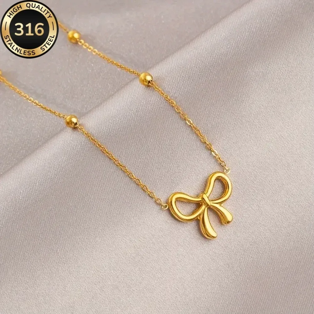 in16-316-stainless-steel-bow-necklace-gold-main