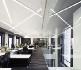 Custom LED linear lighting in a modern office, continuous rows and custom shapes