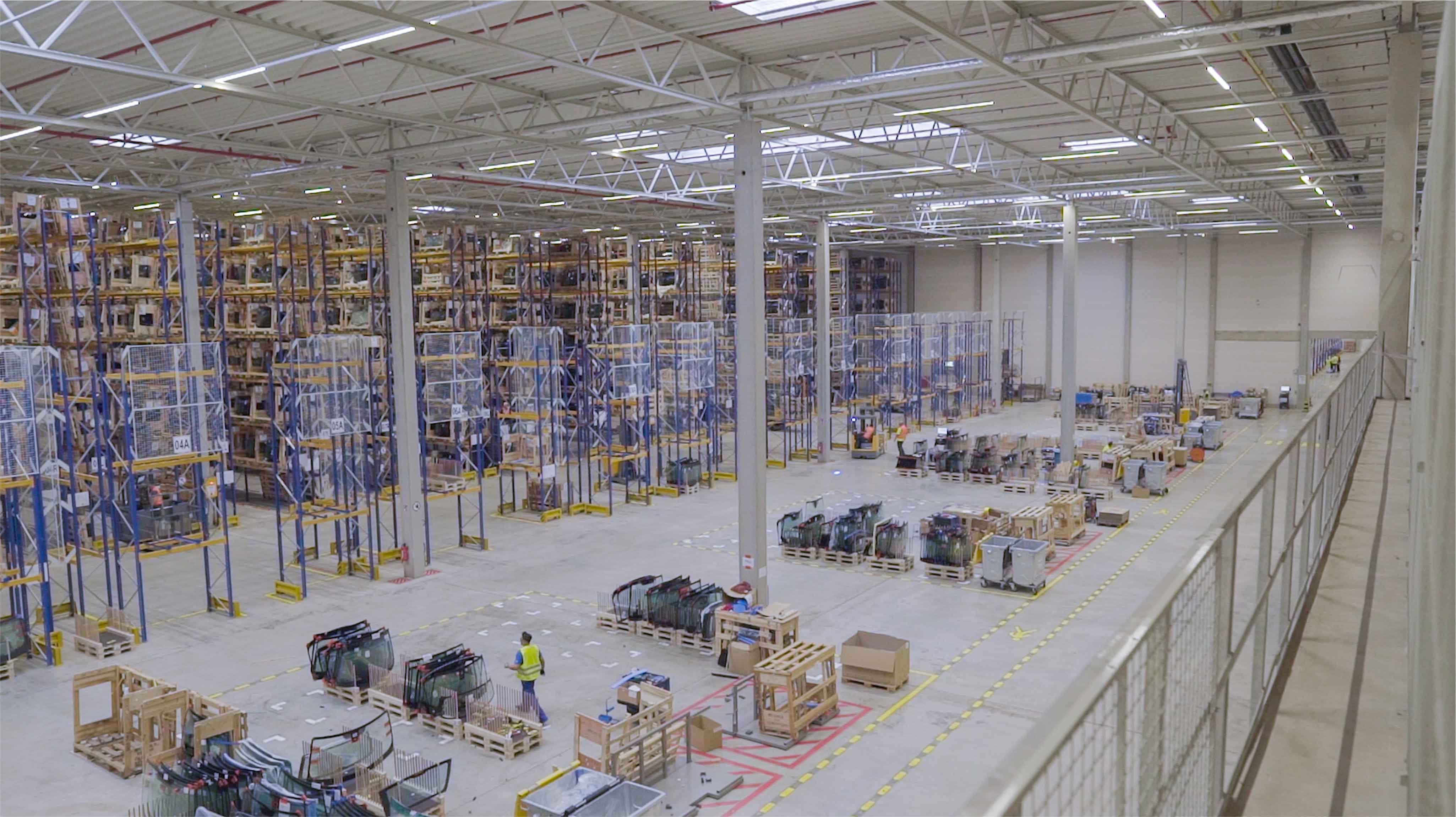 Warehouse interior illuminated by LED high bay lights