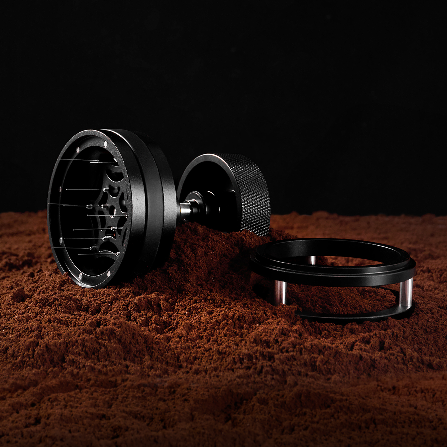 WDT tool components arranged beside coffee grounds