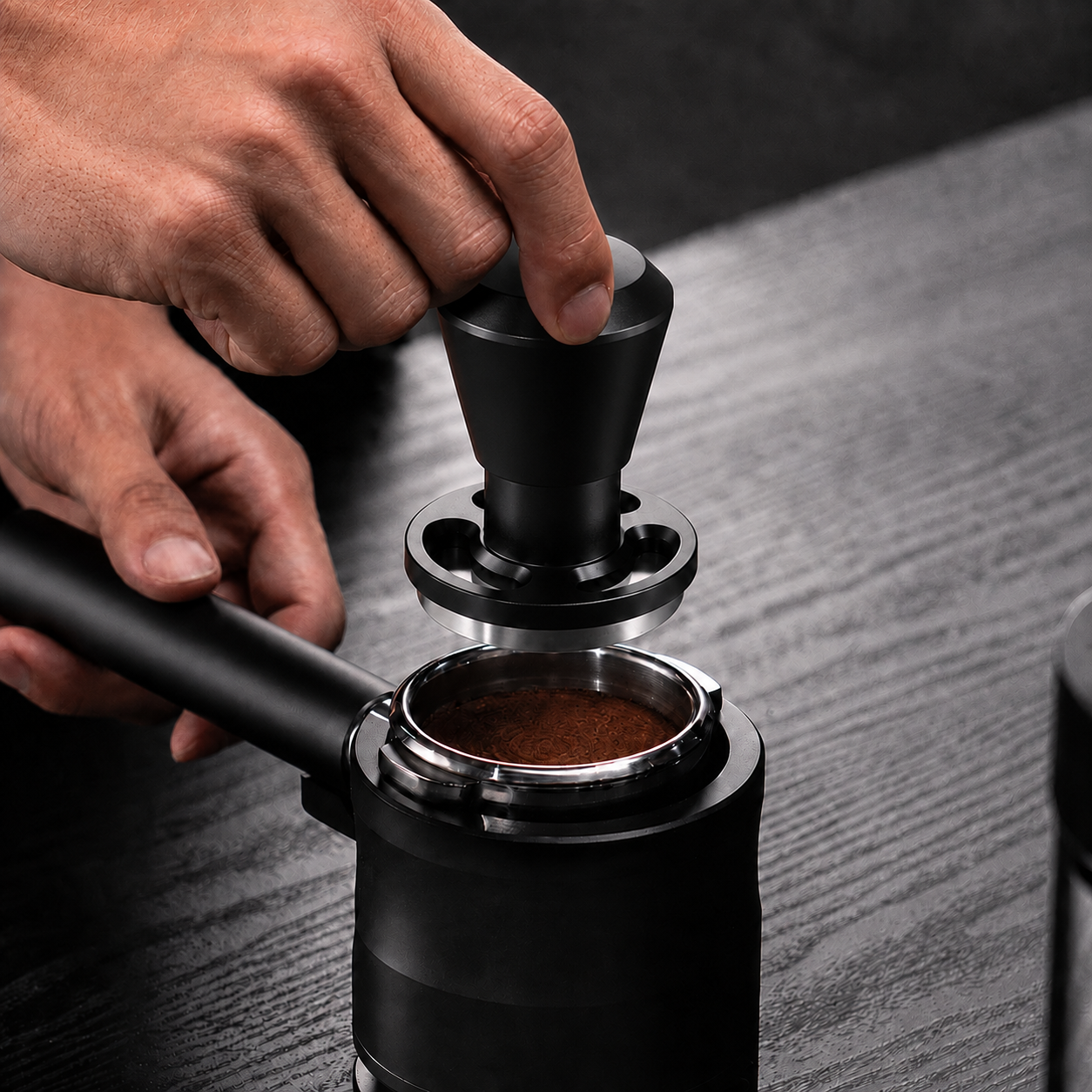 Impact tamper used at an espresso machine