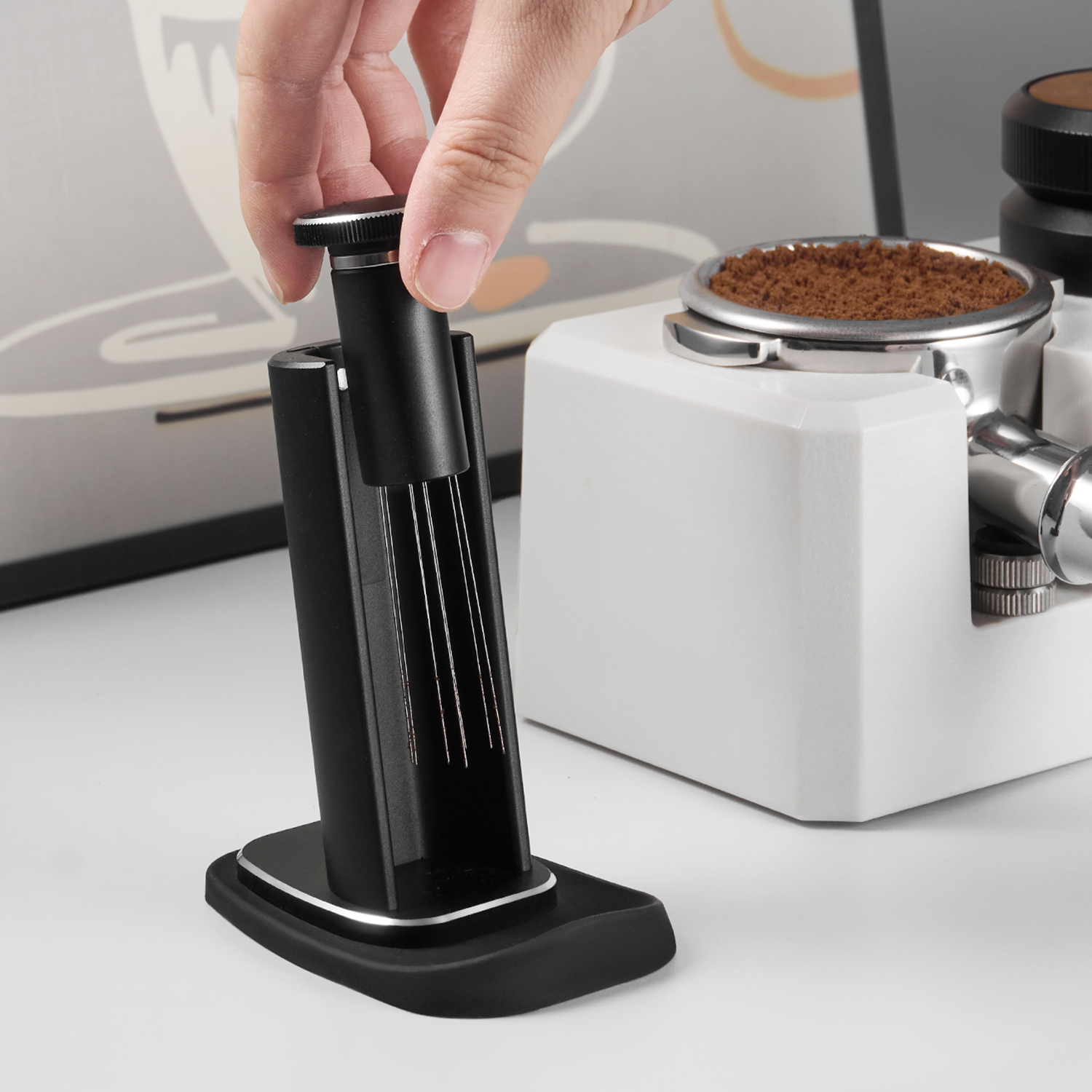 Handheld WDT tool lifted from its upright storage holder