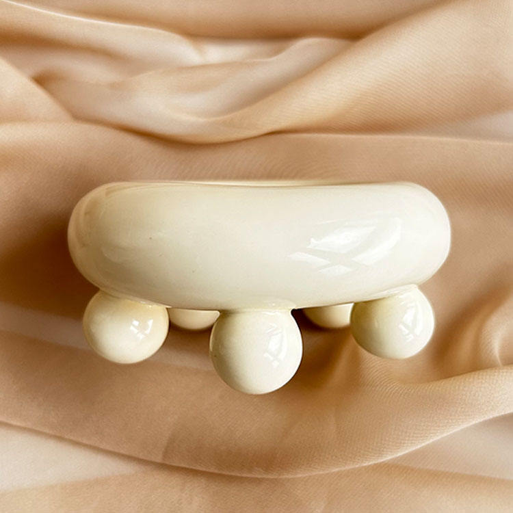 Ceramic donut shape gua sha massager view 4