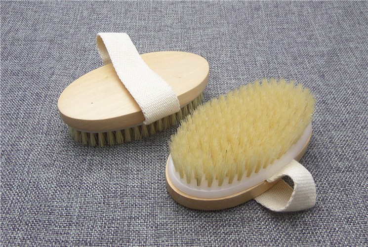 Dry body brush with the cotton strap visible
