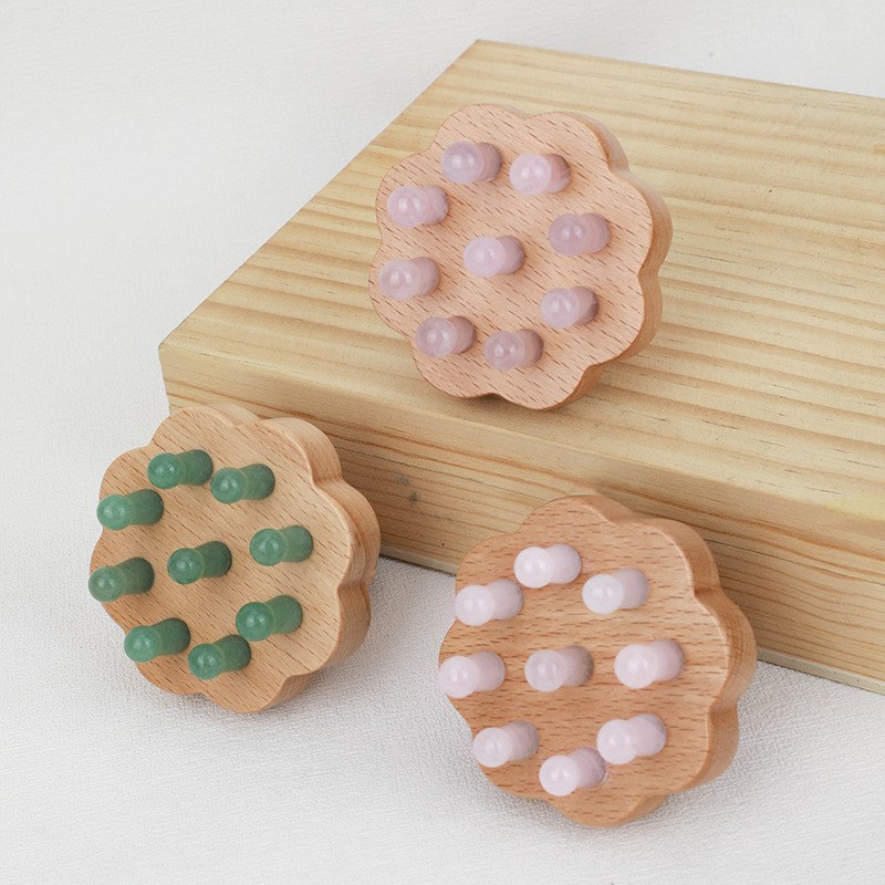 Lotus comb resting on a wooden gift box