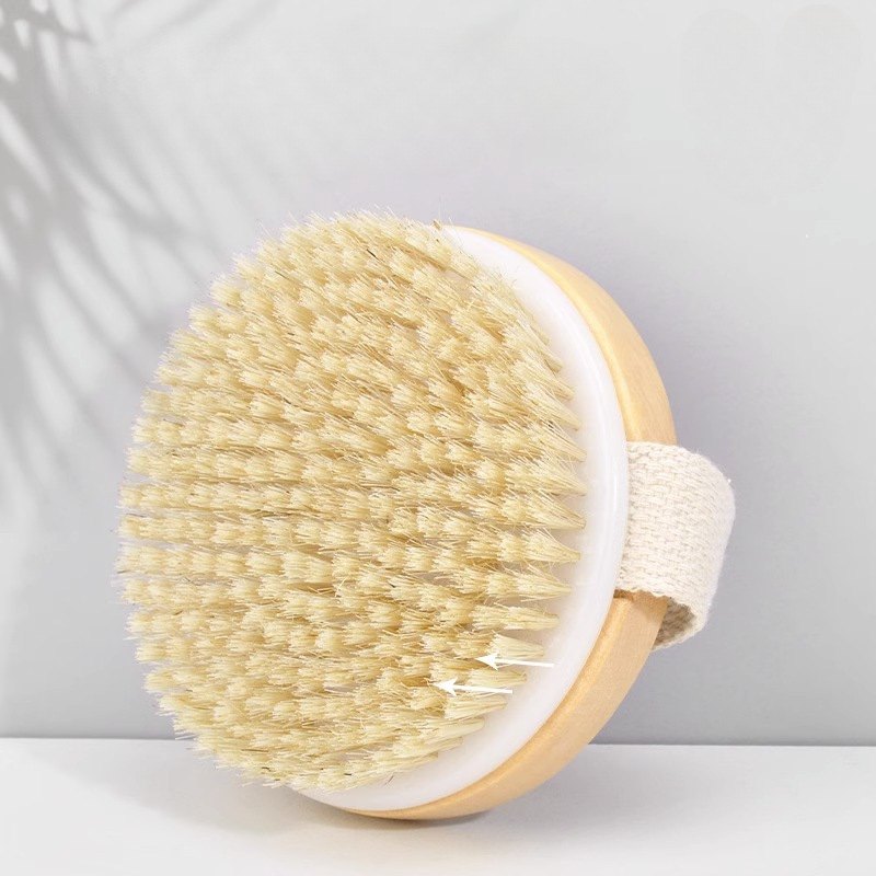 Side profile of the boar bristle brush with wooden back
