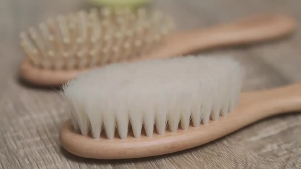 Goat hair brush pair close-up on wood table