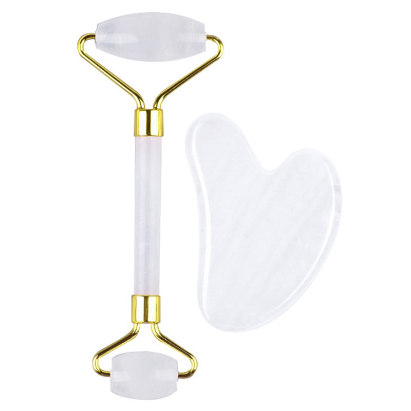 Clear quartz roller and gua sha heart stone set
