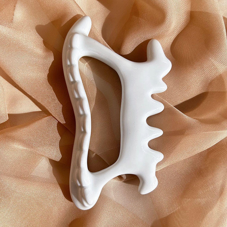 GSK09 Ceramic Bone-Shape Gua Sha Board with Teeth view 3