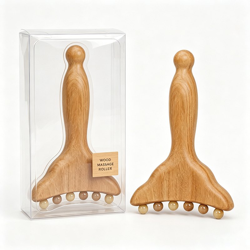 Green sandalwood fishtail massage tool with six horn beads, in a clear gift box