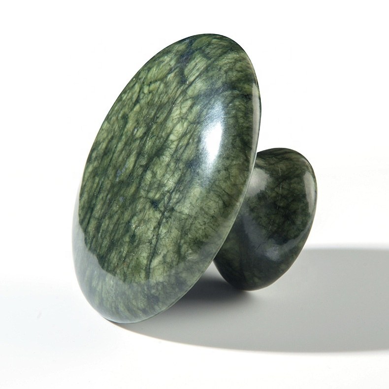 Angled view of the jade mushroom massager