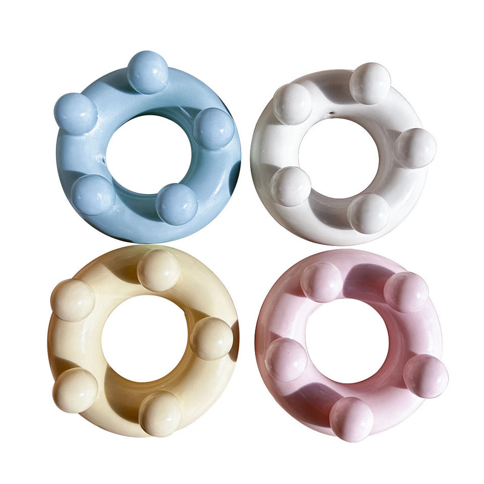 Ceramic donut shape gua sha massager view 1