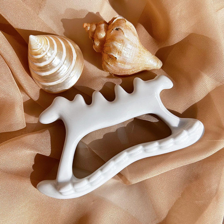 GSK09 Ceramic Bone-Shape Gua Sha Board with Teeth view 6