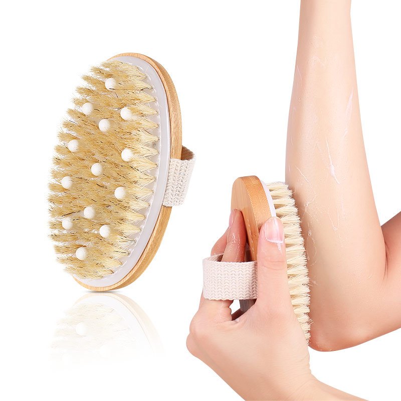 Holding the wooden bath scrubber with cotton strap