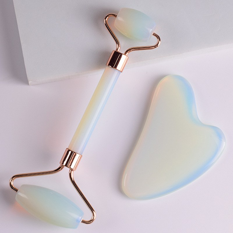 Opalite roller and heart board flat lay