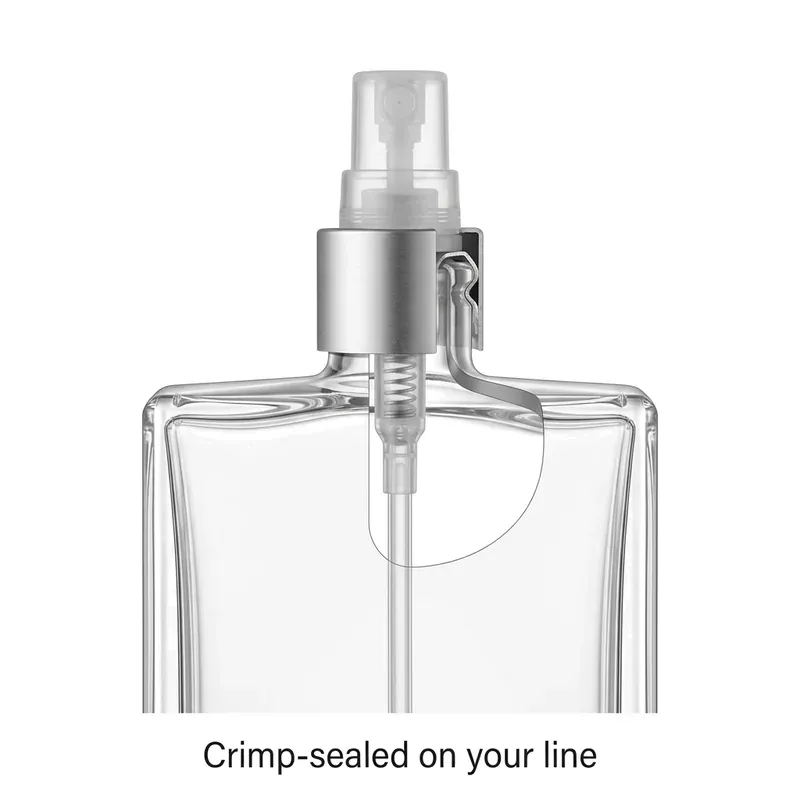 Cutaway of the FEA15 pump crimp-sealed into a square glass bottle neck with the dip tube reaching down — crimp-sealed on your line