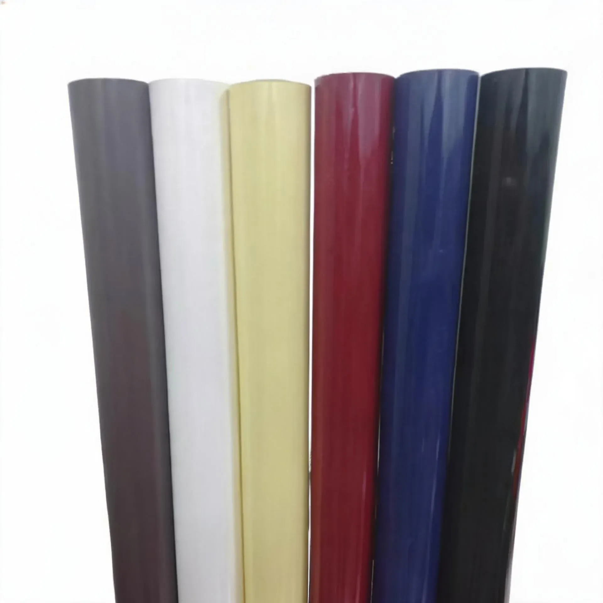 Six rolls of pigment foil in grey, white, gold, red, blue and black