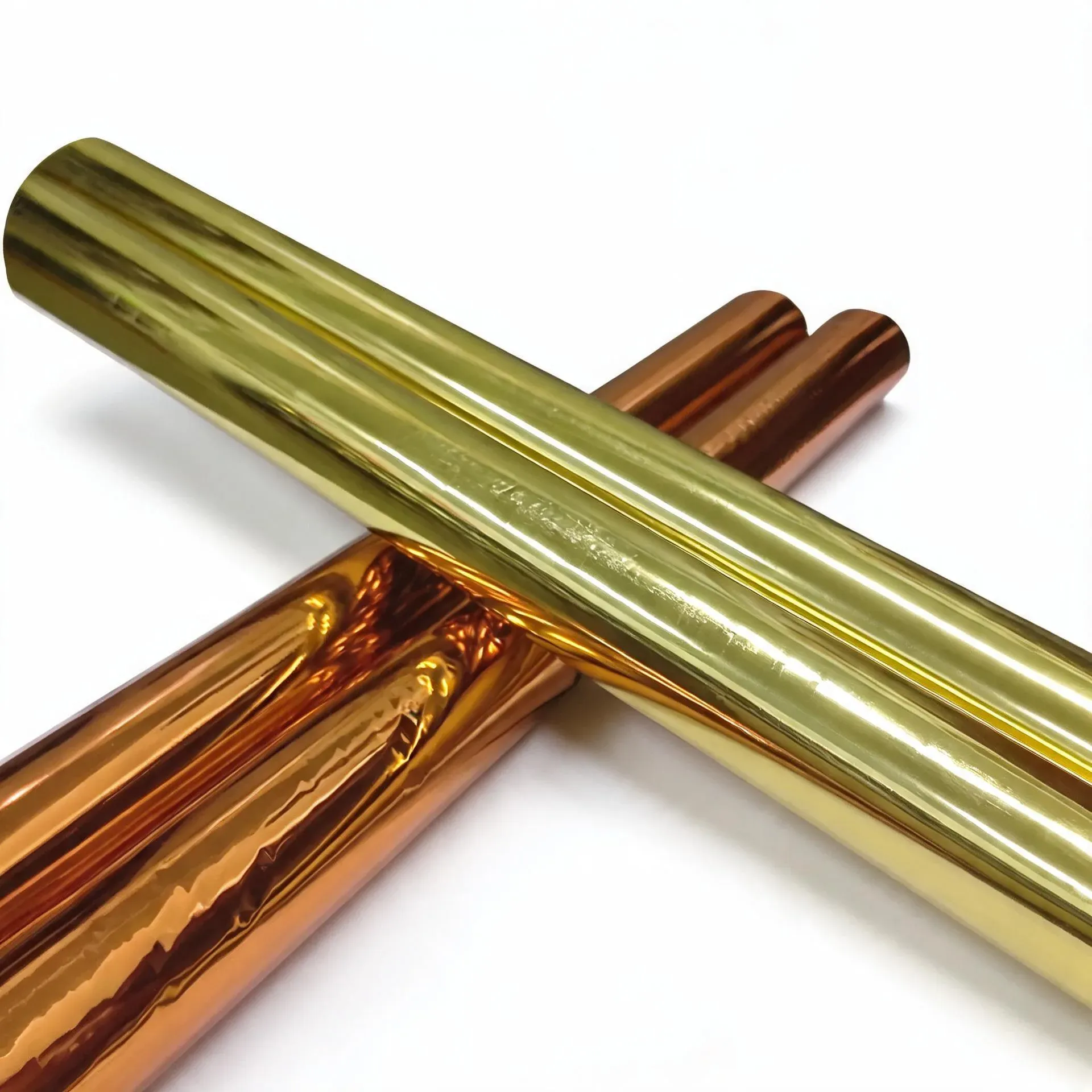 Copper and gold hot stamping foil rolls close-up