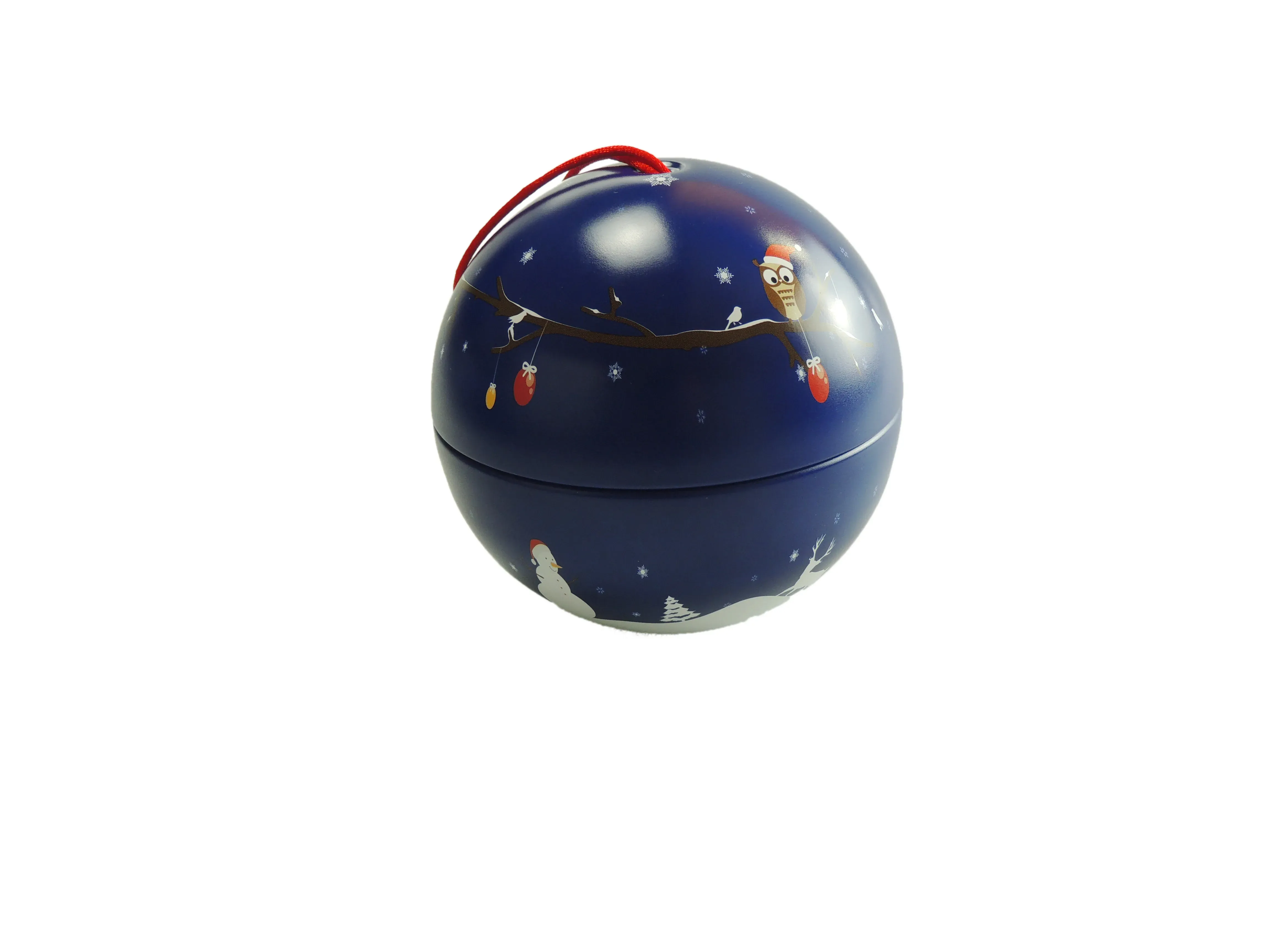 Christmas ball-shaped tin in blue, printed with an owl on a branch and hanging ornaments, with a red ribbon loop