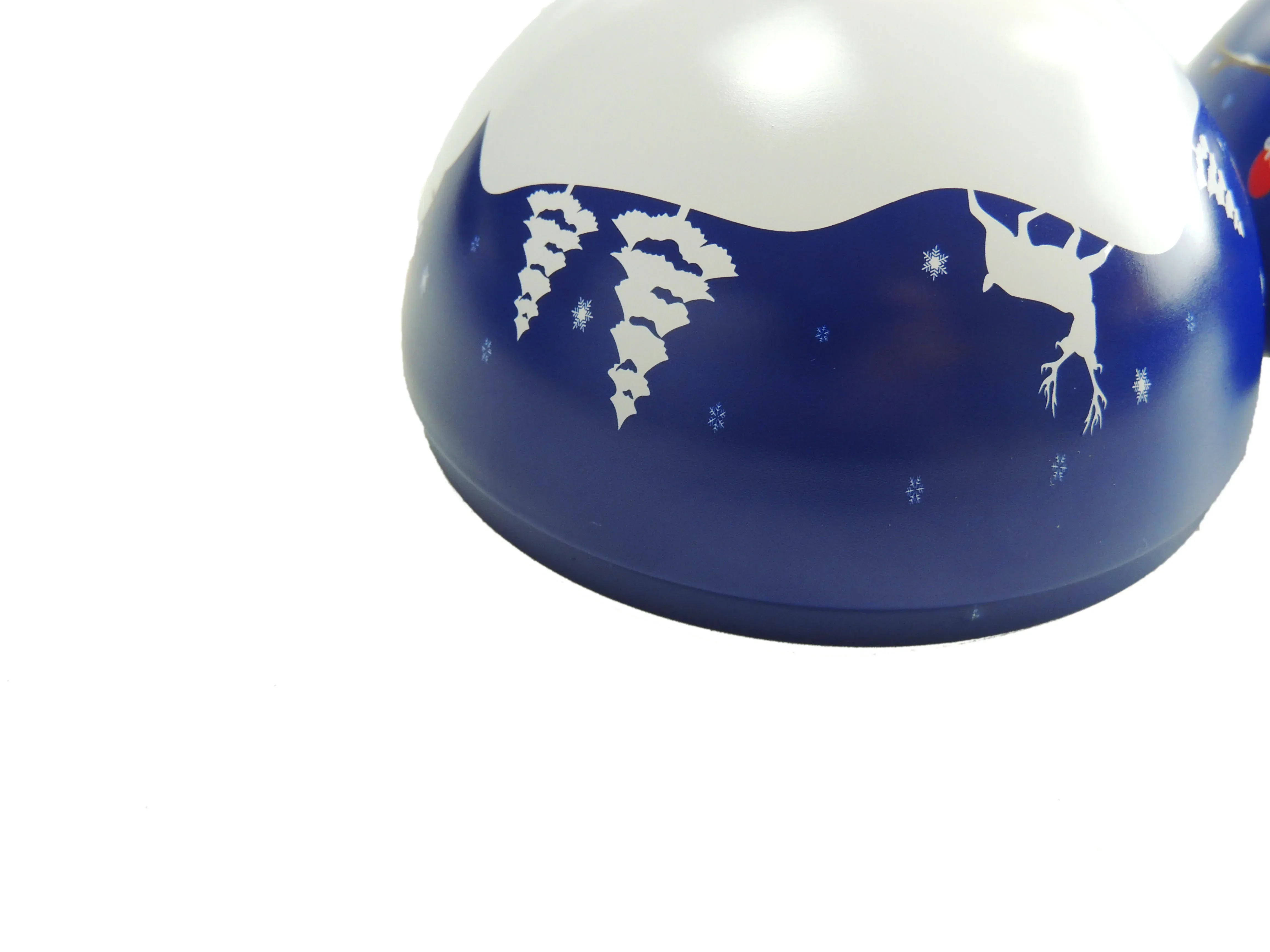 Christmas ball tin split into its two printed halves: the blue lid with ribbon and the snow-print base