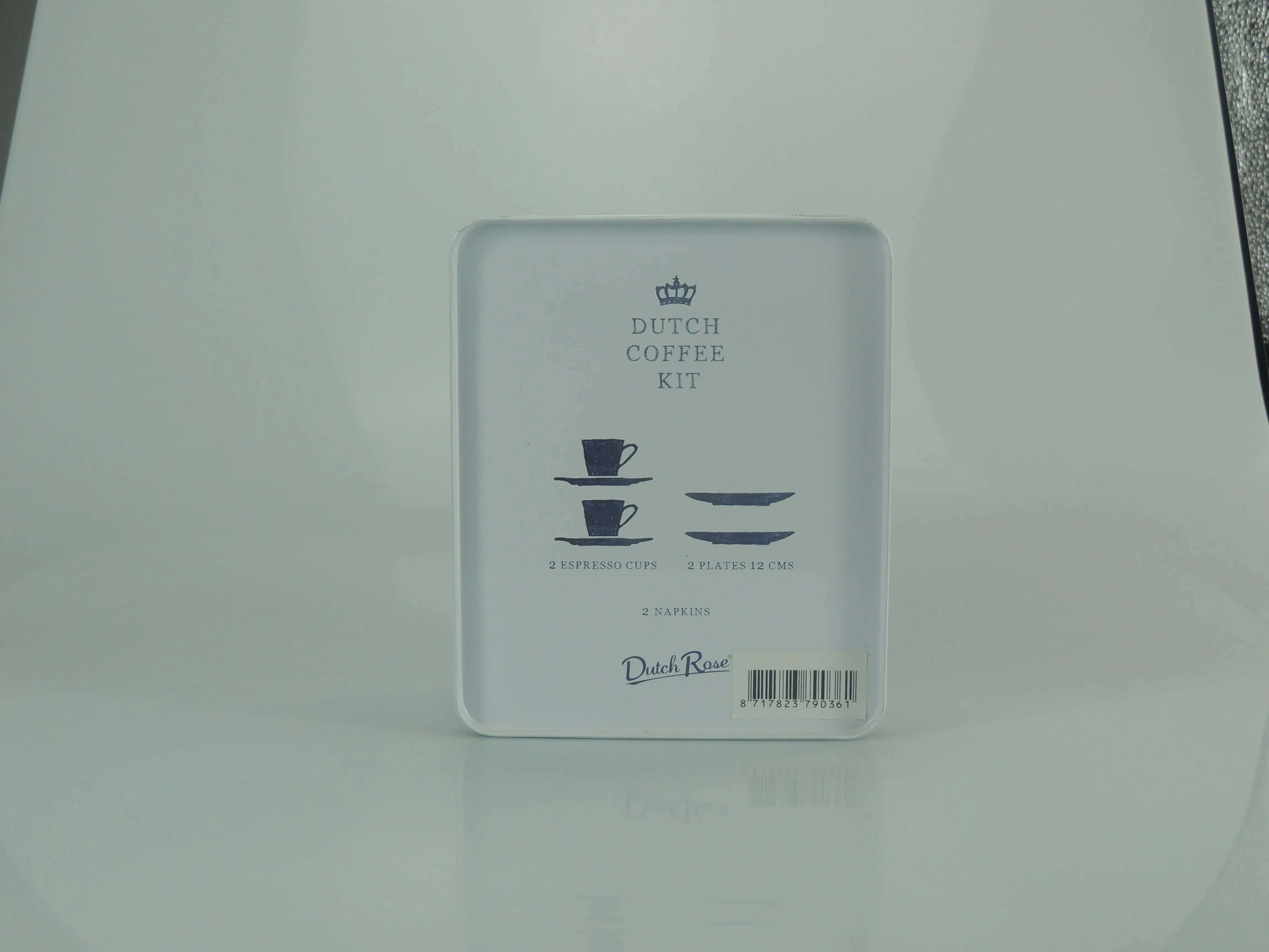 Inside of the coffee-kit tin lid, listing the set contents in print