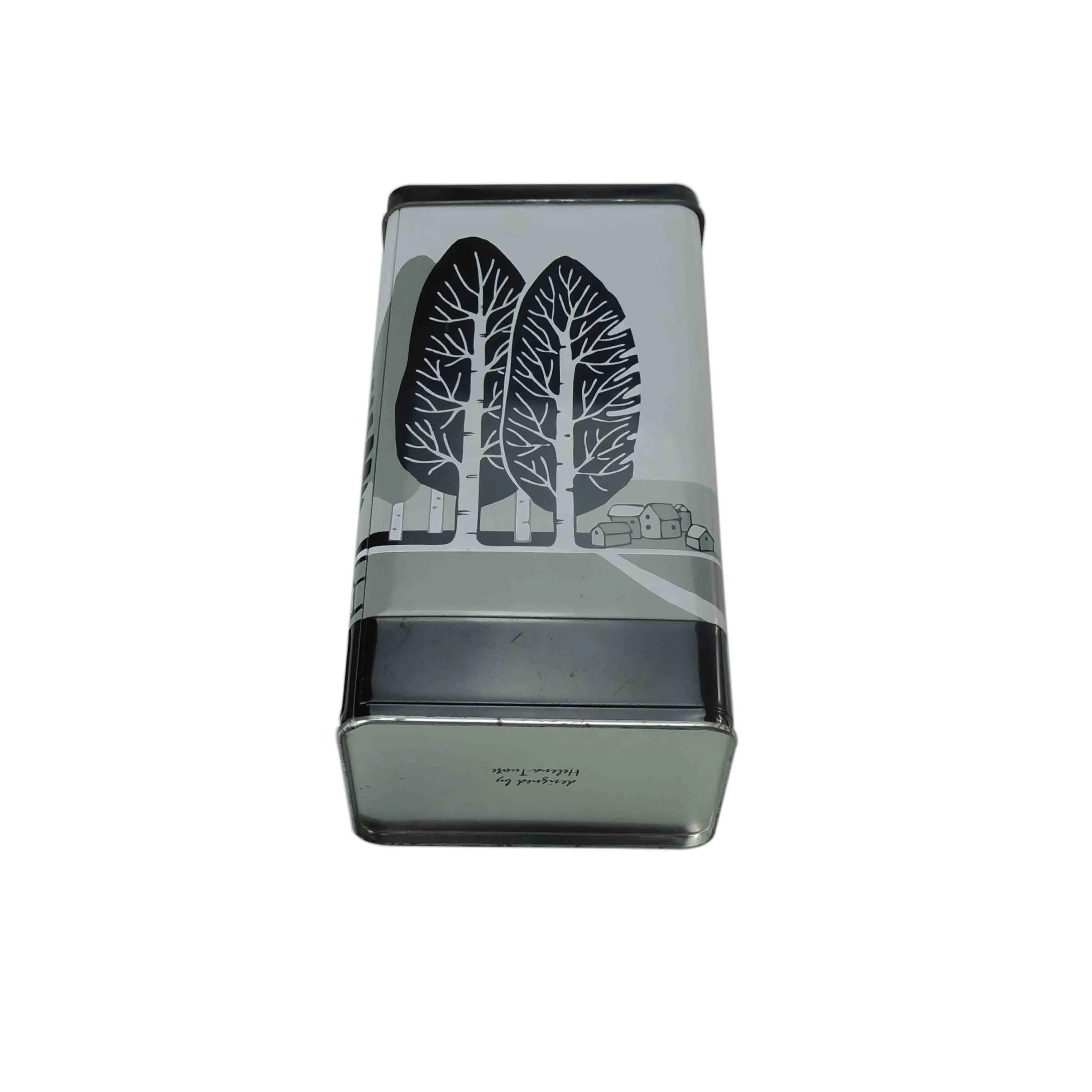 Black-and-white rectangular tin with tree artwork on the tall body