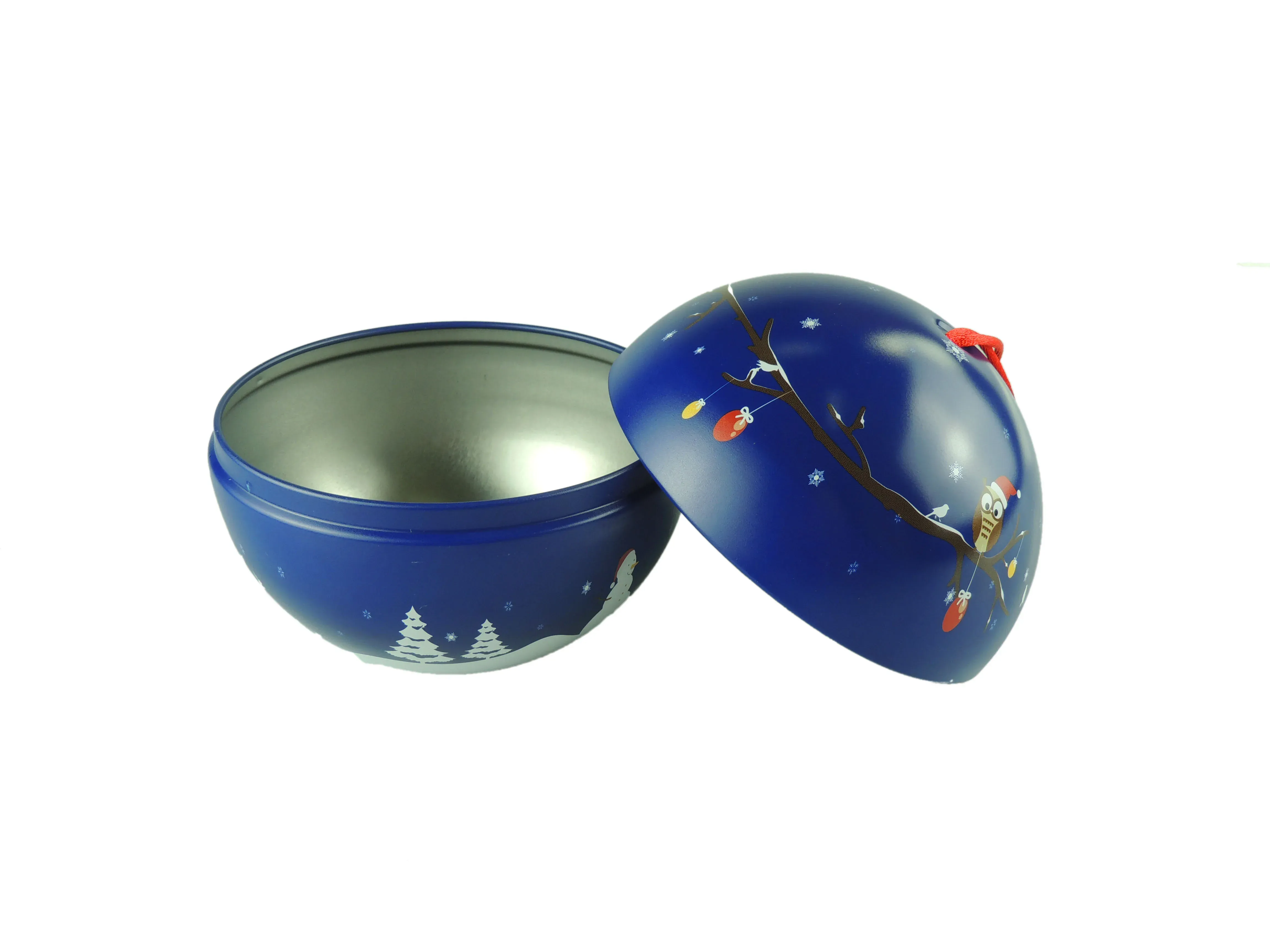 Two halves of the blue Christmas ball tin angled to show the printed shell and the open interior