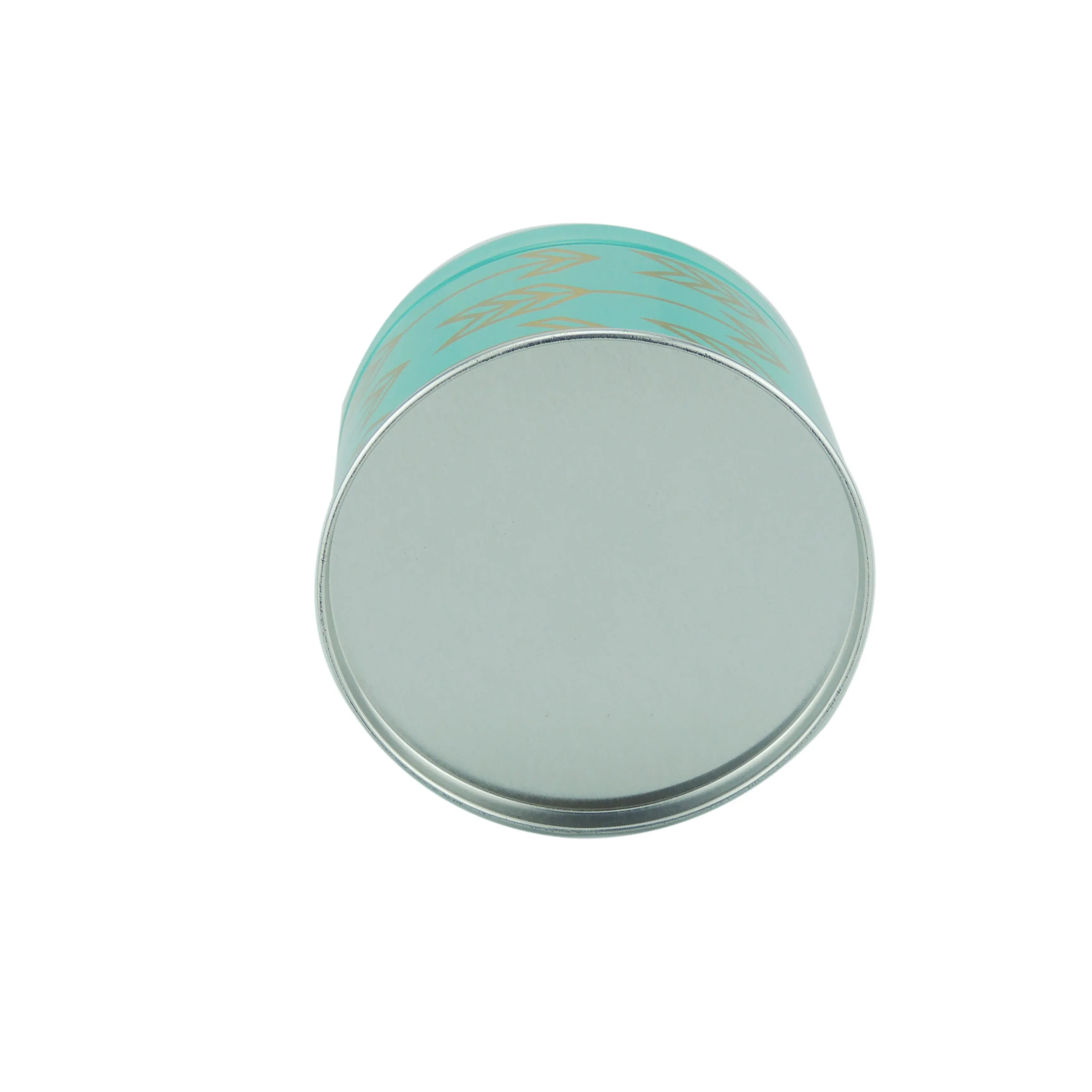 Round tea caddy shown from below, the plain tinplate base facing the camera