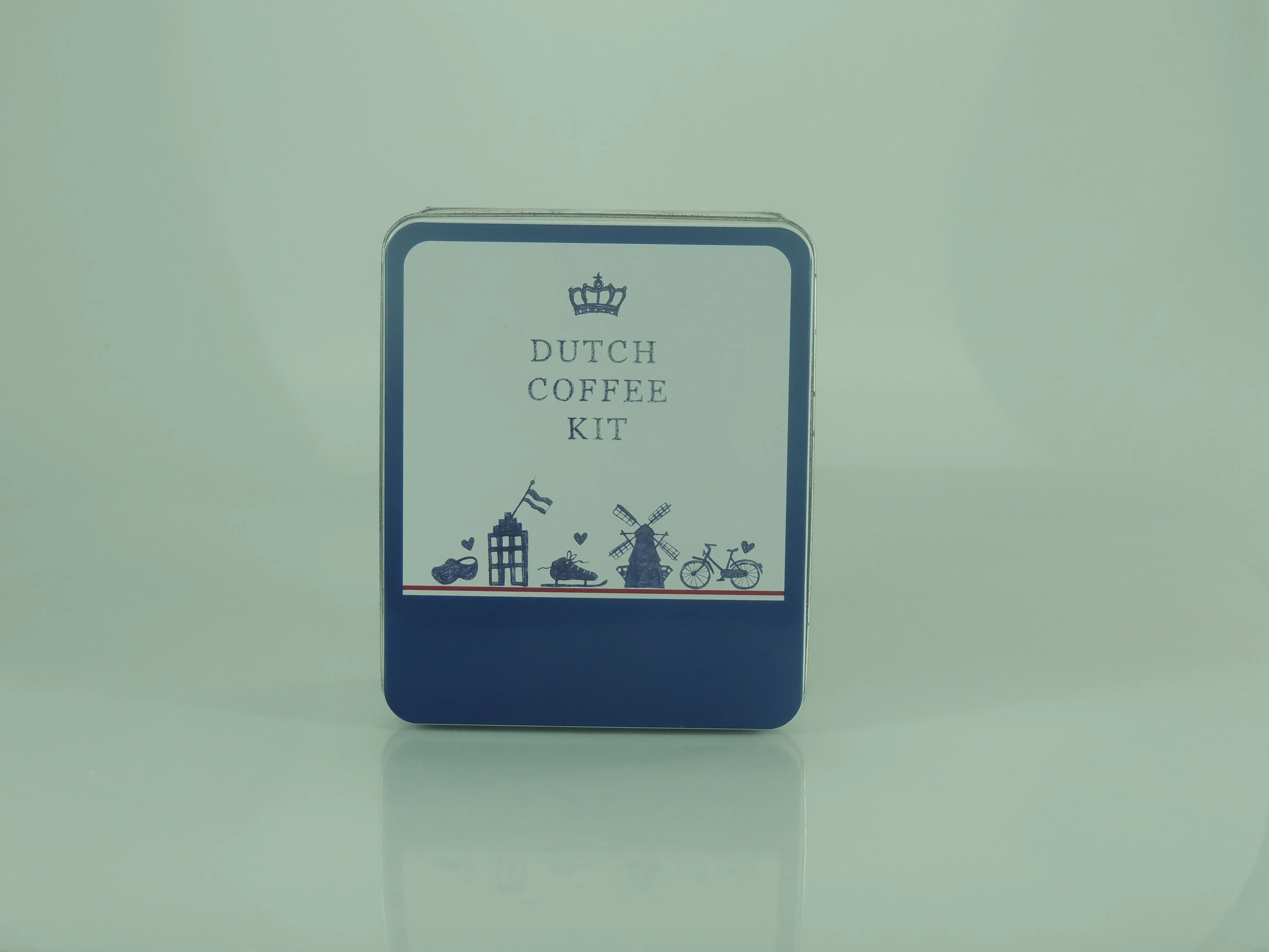 Square gift tin with a Delft-blue lid printed with a crown and canal-house icons