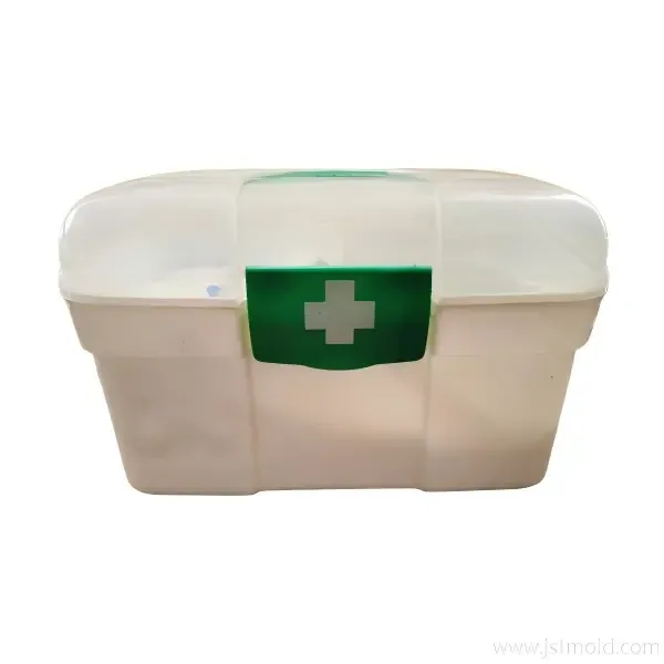Compact first aid organizer box with a clear plastic lid and green safety buckle.