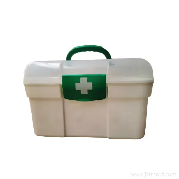 Front view of a portable white medical storage box with an ergonomic green handle and translucent lid.