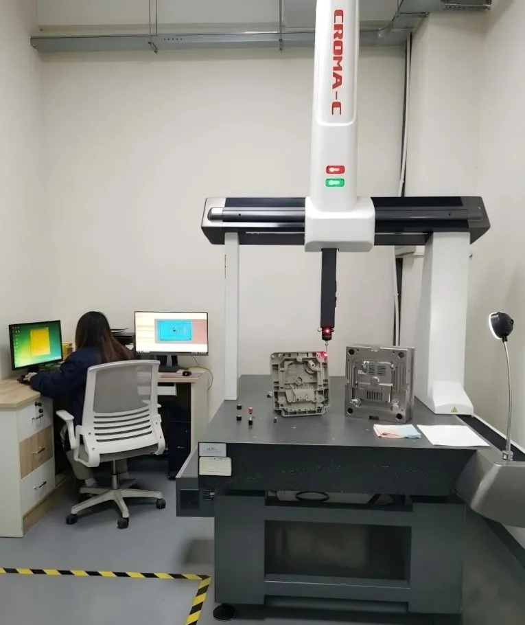 Precision CMM measuring machine at JST Mould quality lab for dimensional verification and PPAP reports.