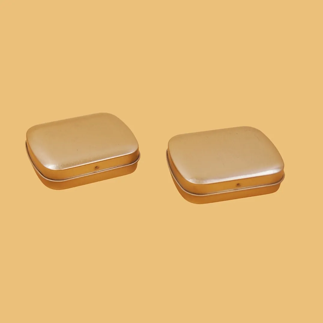 Small square gold tin boxes set