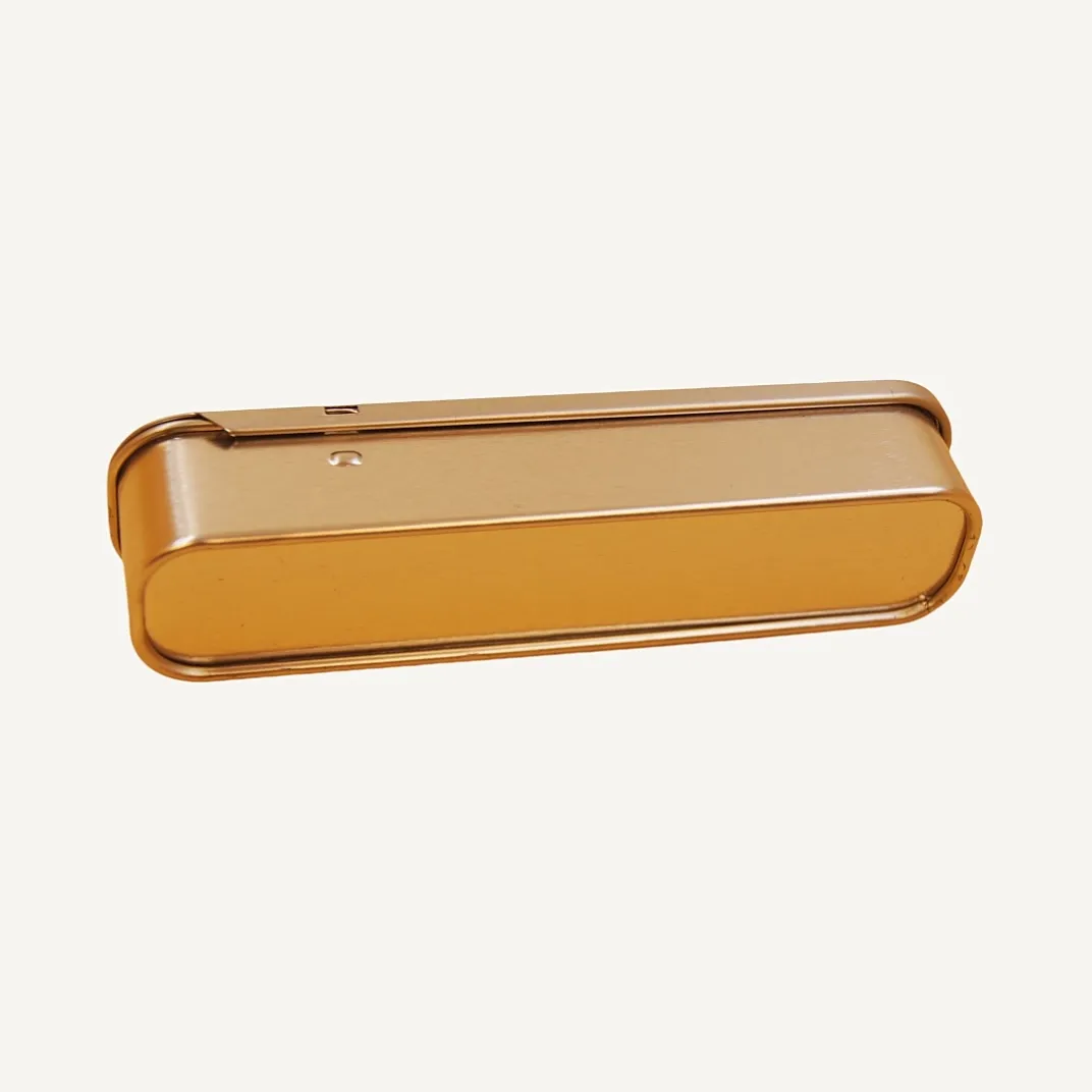 Long narrow gold tin tray interior view