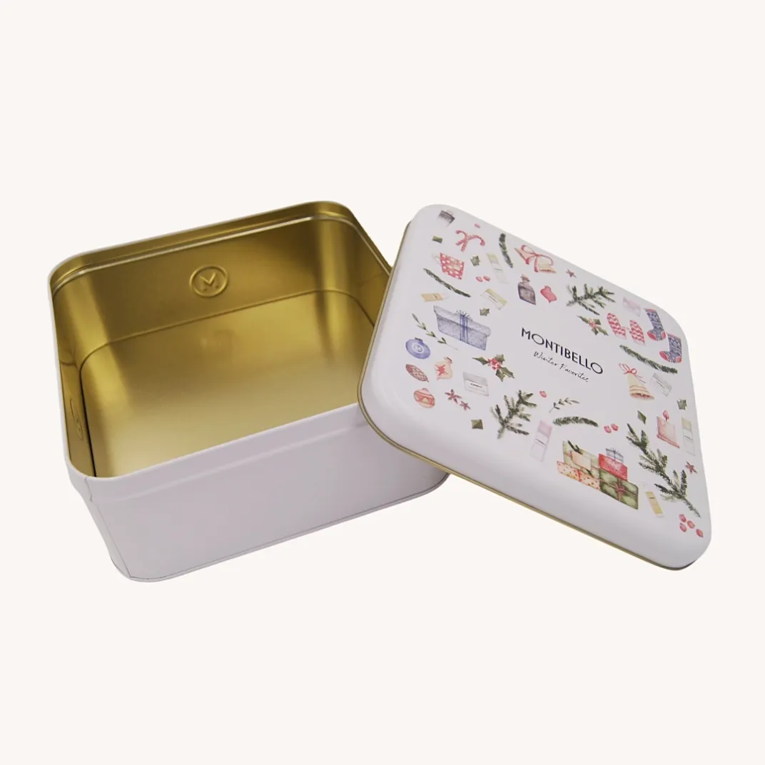 Open pastel square Christmas gift tin box with gold interior