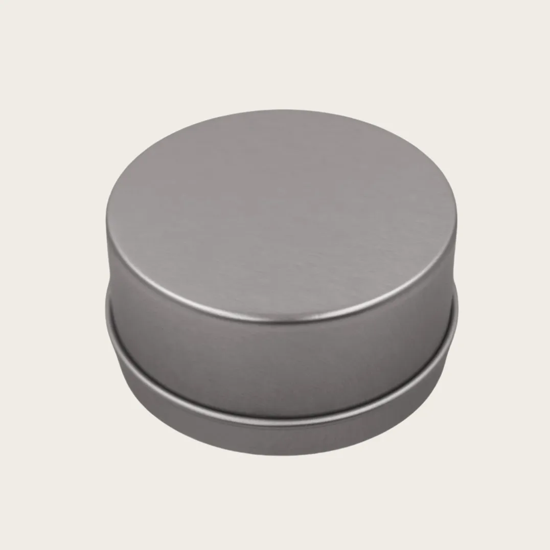 Round silver metal tin box front view