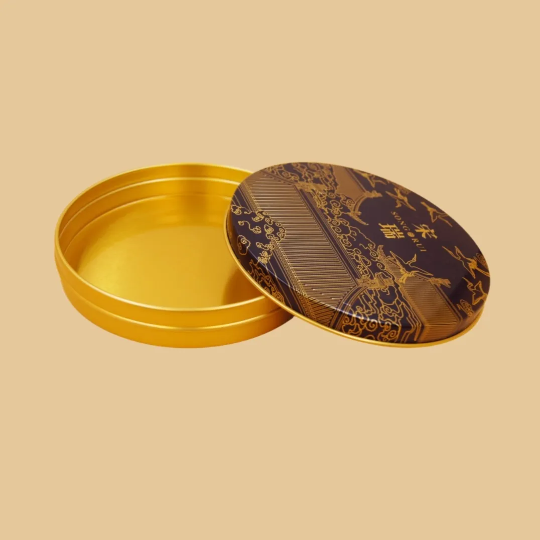 open round dark purple printed tin box with gold interior and removable lid