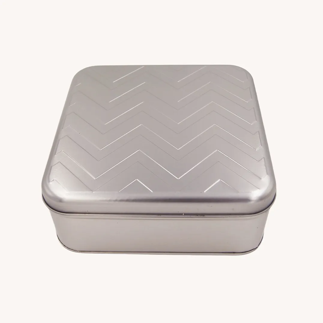 Silver square embossed tin box with chevron lid