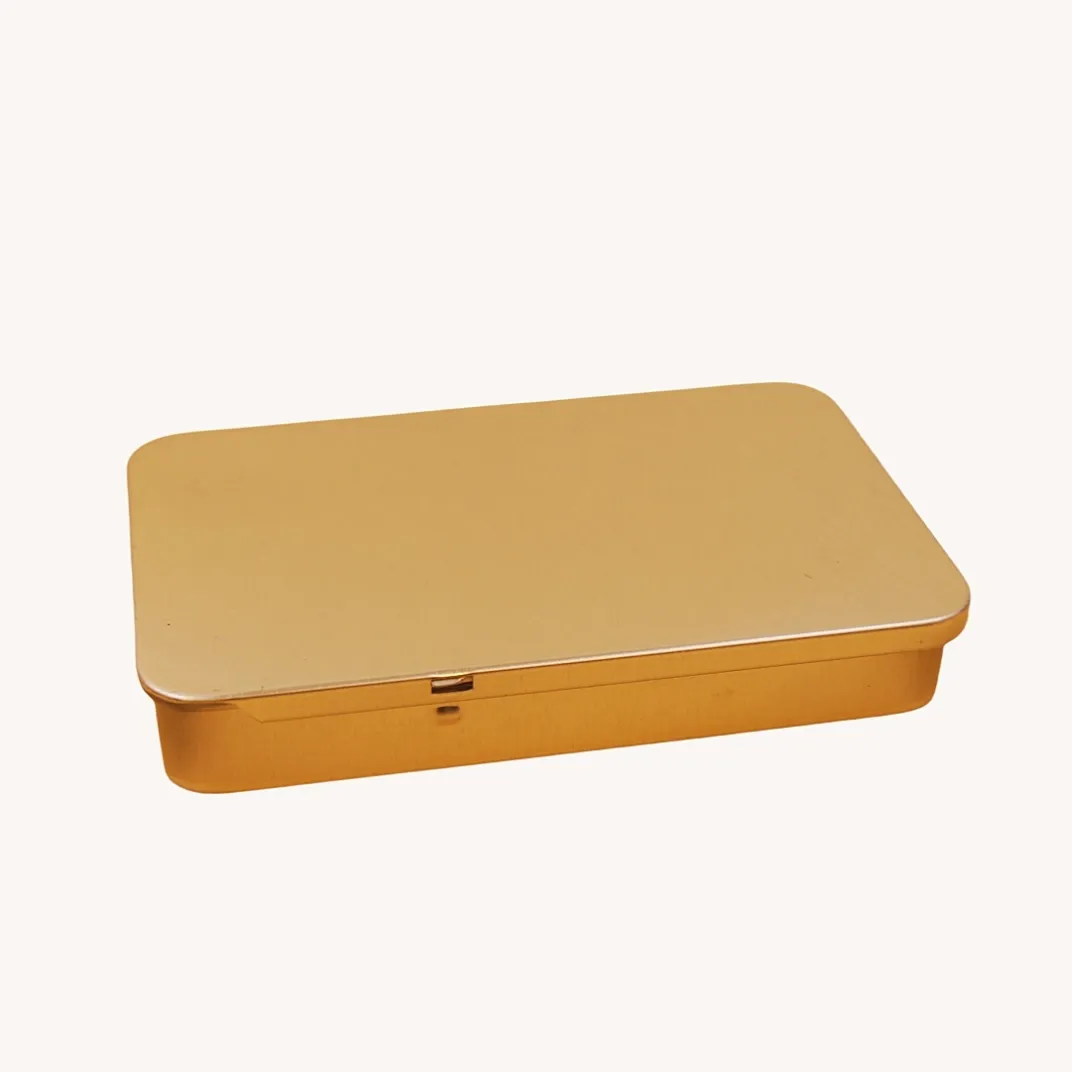 Flat rectangular gold tin box with rounded corners