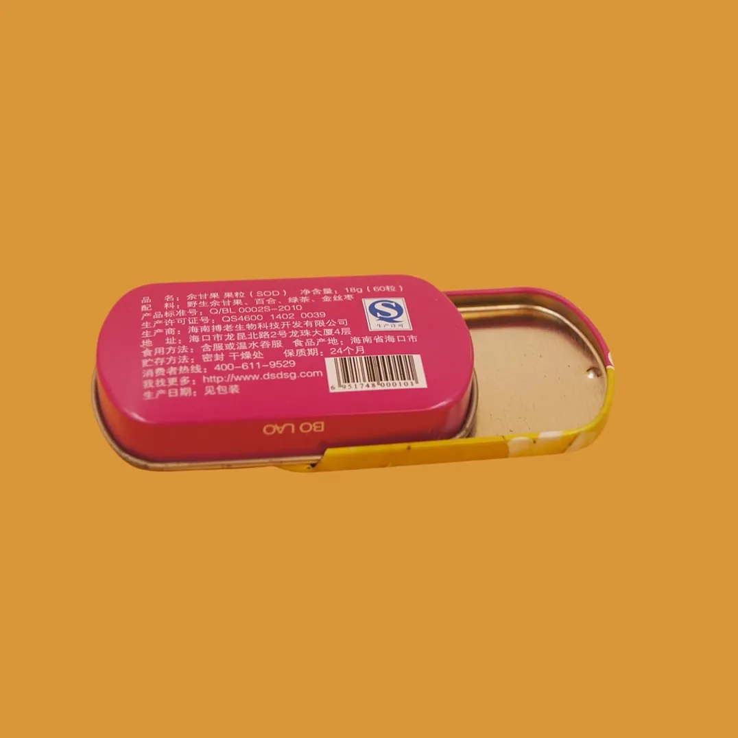 Pink sliding tin box back label view