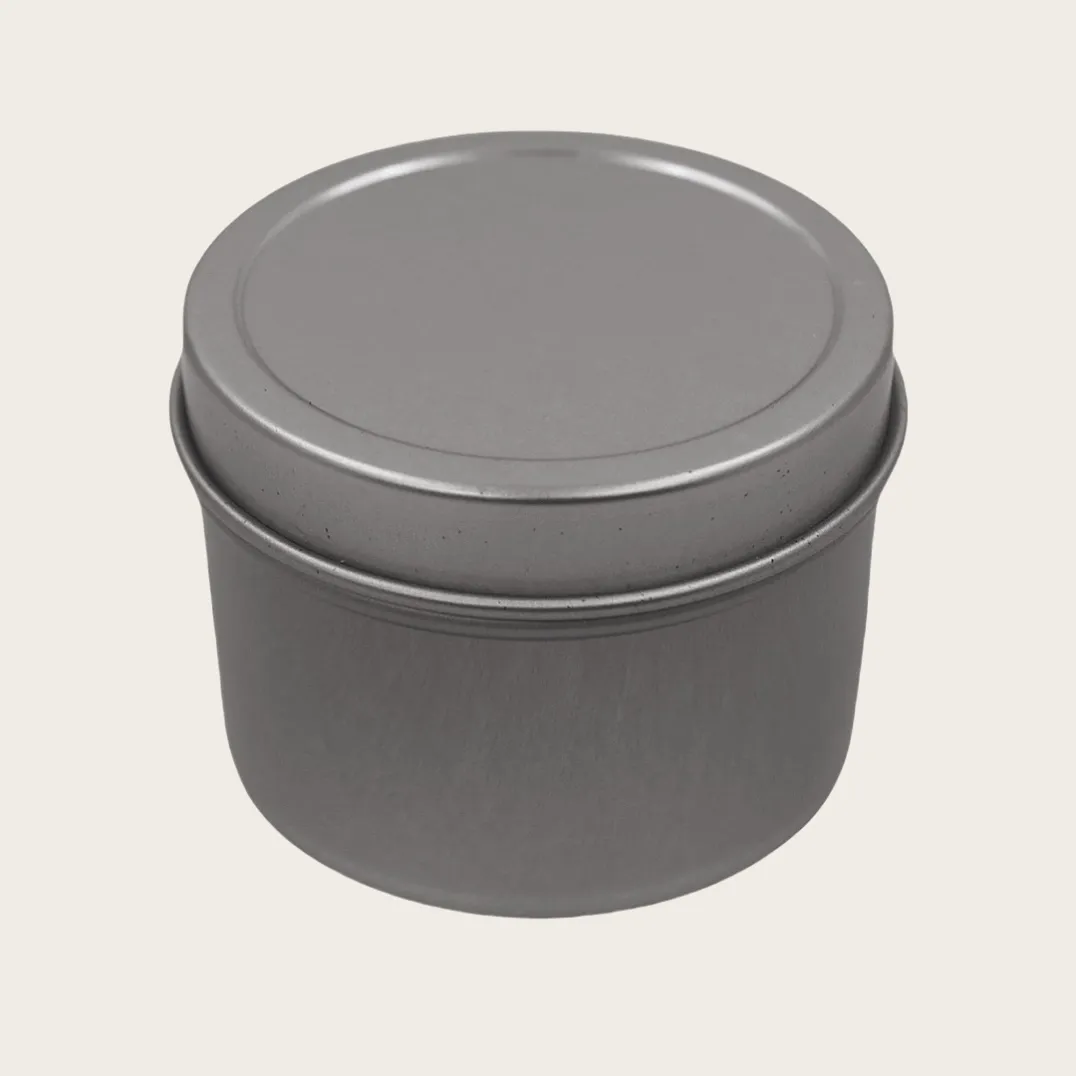Round silver tin canister with press lid