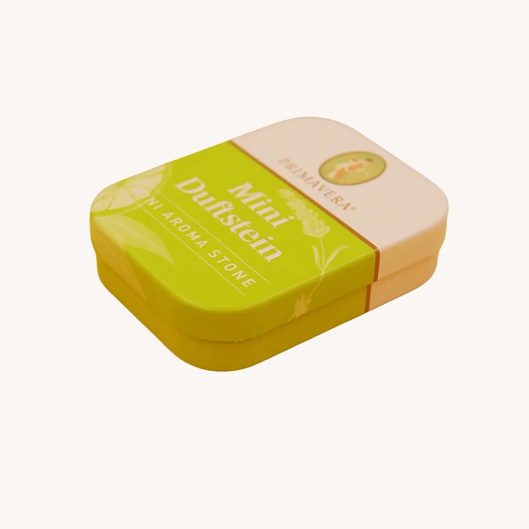 Green rectangular hinged candy tin box closed view