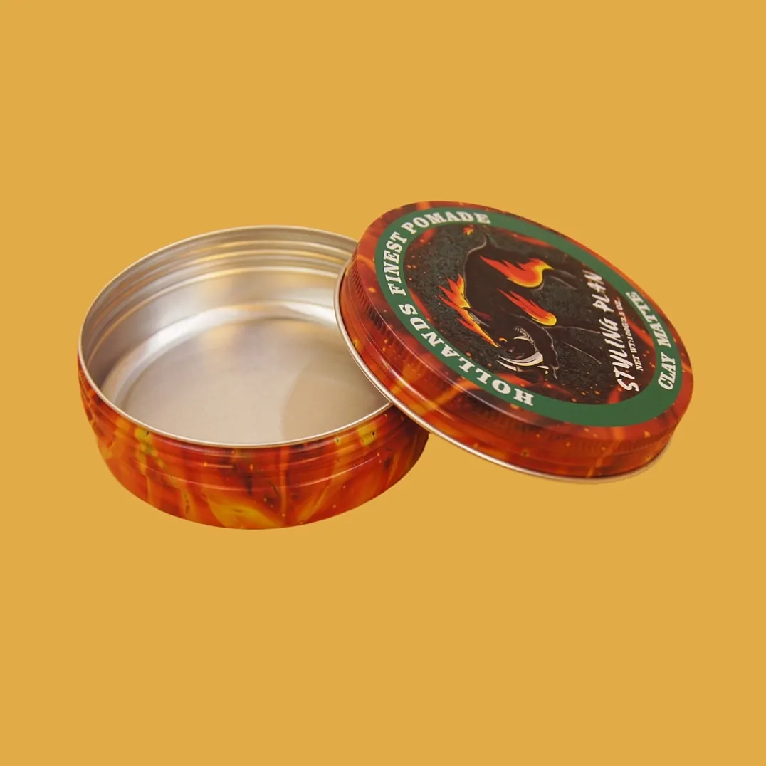 open round black and red printed tin box with silver interior for candy, biscuits or gifts