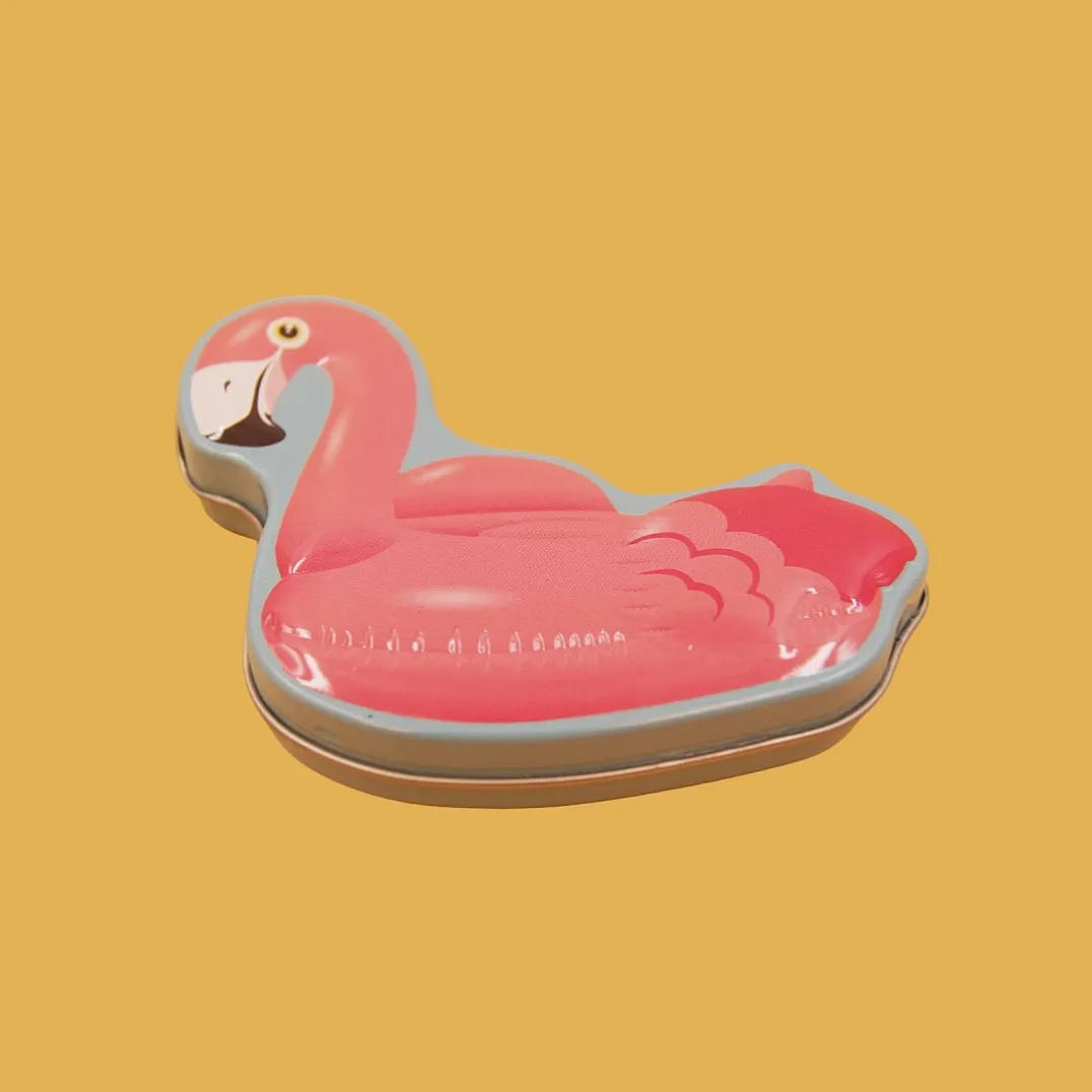 Pink flamingo shaped tin box closed view